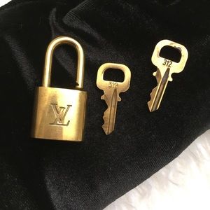 Authentic Louis Vuitton padlock lock and key set